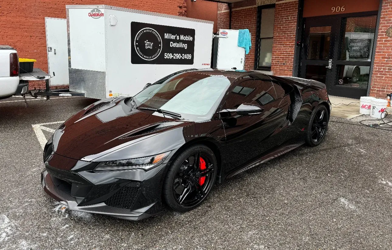Miller's Automotive detailer working on a vehicle